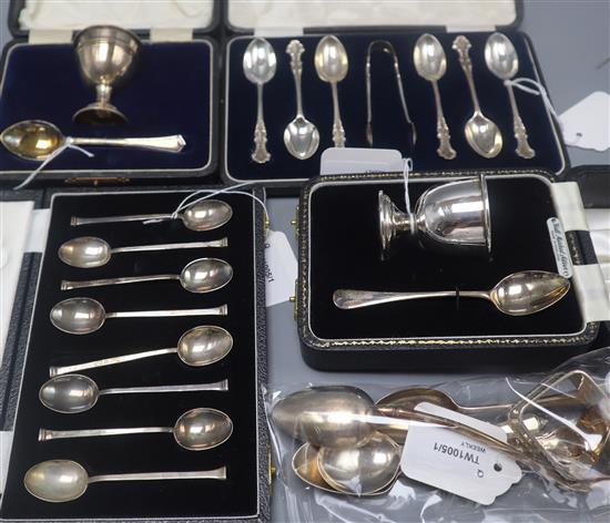 Two silver Christening sets, two sets of six silver coffee spoons (one with tongs), a napkin ring and five various spoons